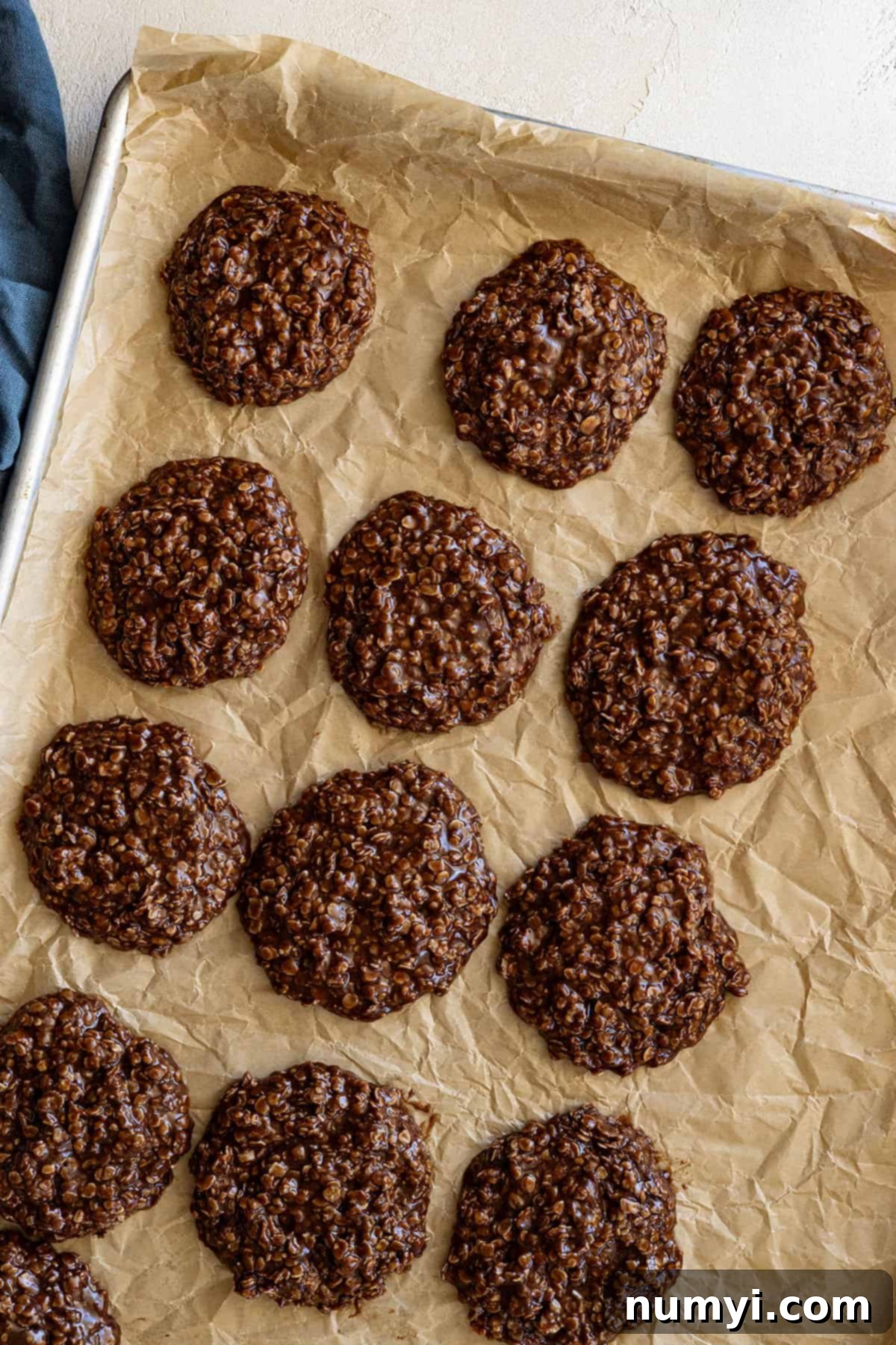 Peanut Butter Chocolate No-Bake Bliss Bombs 5 Overhead view of cookies on a baking sheet cooling.