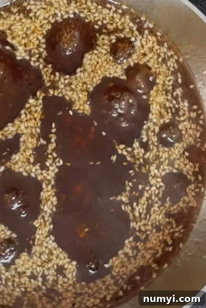 Mouthwatering Golden Crispy Teriyaki Thighs 8 Sesame seeds added to a teriyaki sauce