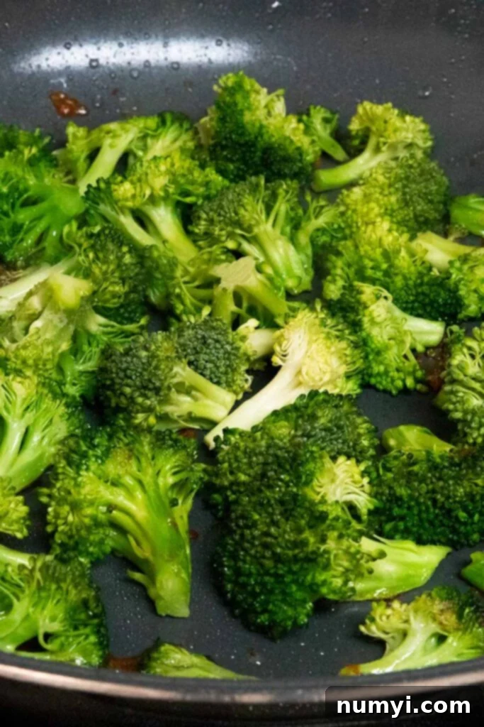 Mouthwatering Golden Crispy Teriyaki Thighs 9 cooked broccoli in a skilletz