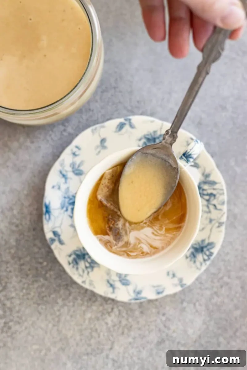 Whip Up Irresistibly Creamy Honey 5 Spoonful of honey going into a cup of tea.