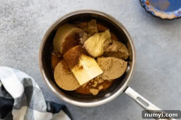 Overhead view of ham glaze ingredients in a saucepan.