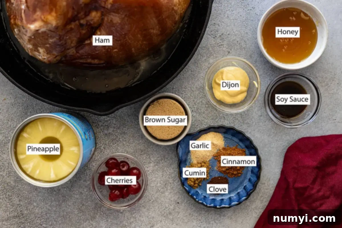 Ingredients: ham, brown sugar, pineapple, honey, cherries, dijon, soy sauce, garlic powder, cinnamon, cumin, and clove. 