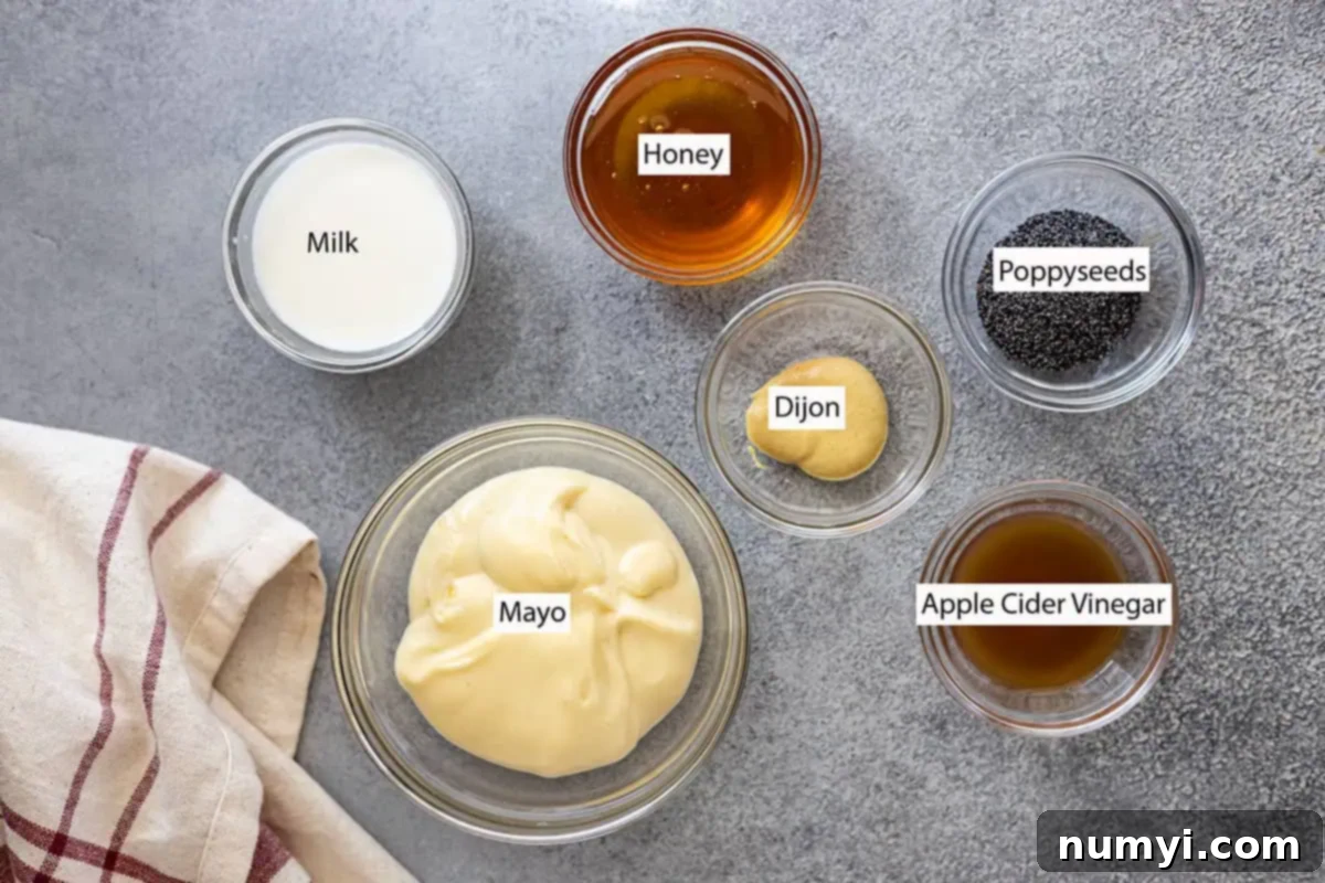 Ingredients: milk, mayo, honey, dijon, poppyseeds, and apple cider vinegar. 