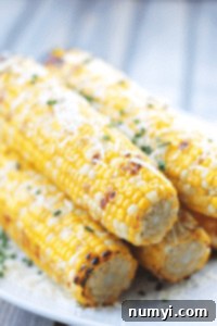 Grilled Parmesan Corn on a plate