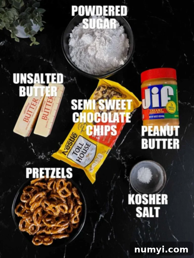 Salty Sweet Peanut Butter Pretzel Bars 3 All key ingredients for making no-bake peanut butter pretzel bars laid out on a dark surface.
