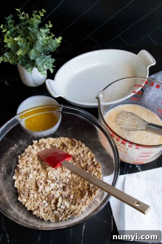 Baked oatmeal ingredients mixed in a large bowl.