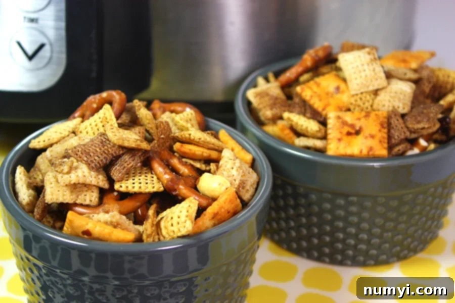 Slow Cooker Chex Mix in two gray ramekins.