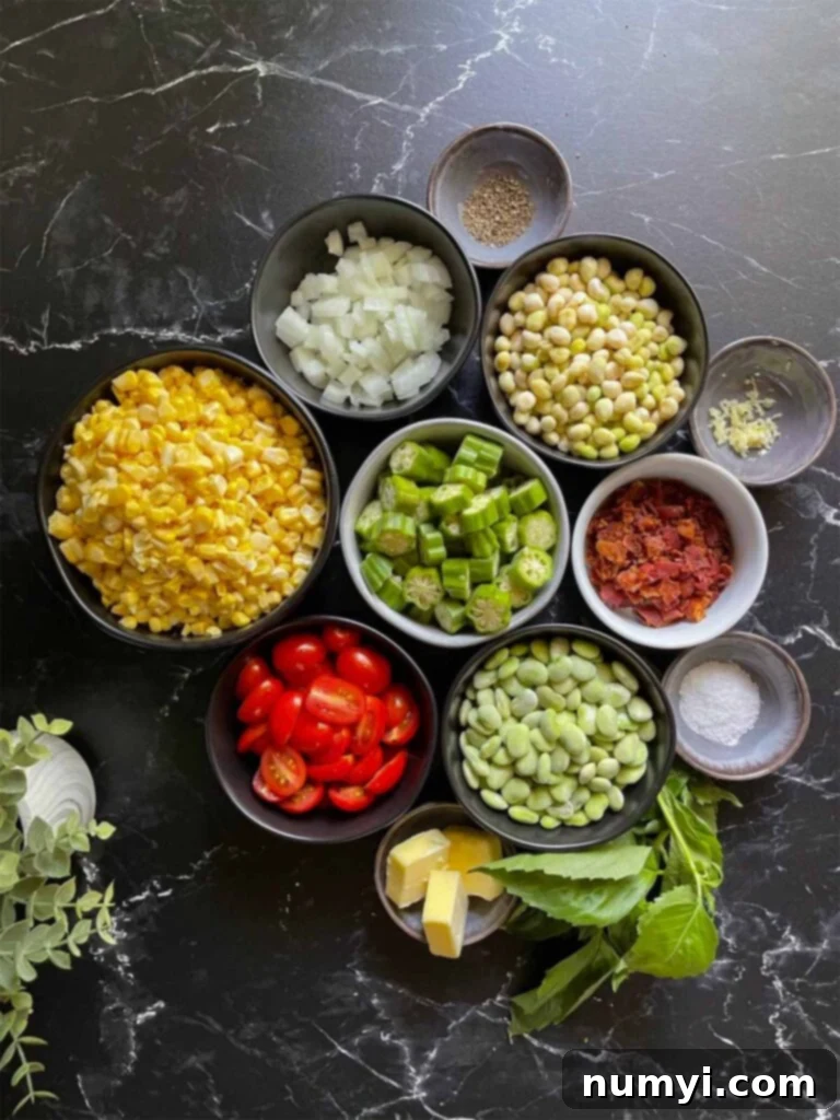Various fresh ingredients for summer succotash, including corn, okra, cherry tomatoes, lima beans, and basil, arranged on a dark surface.