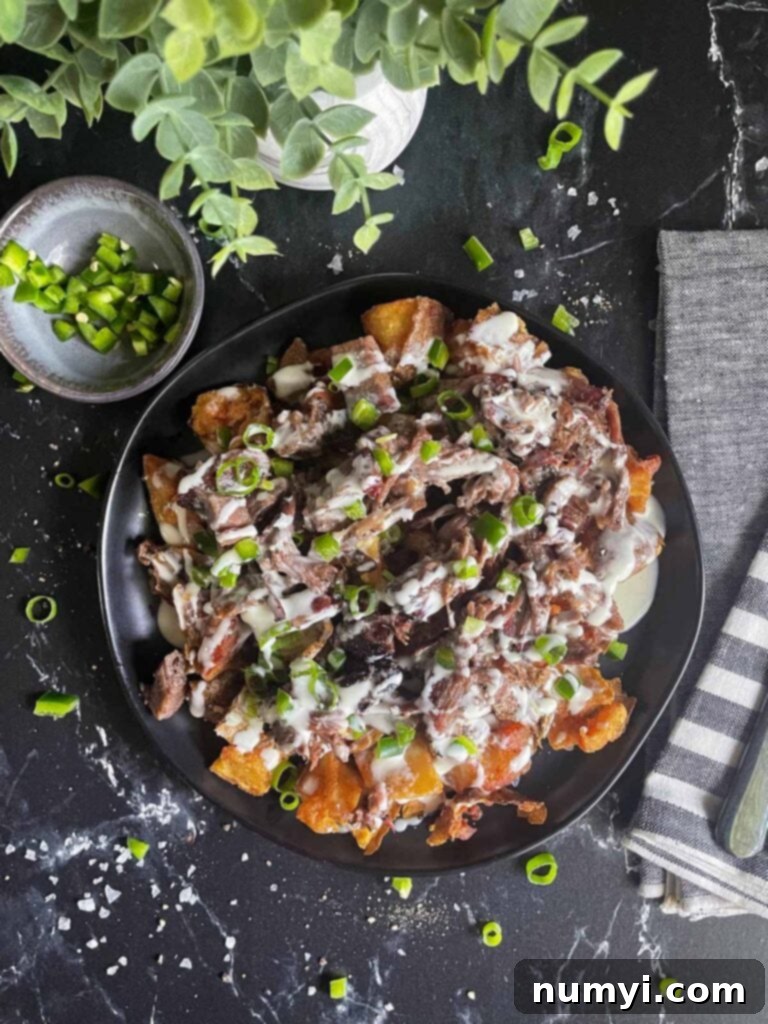 Assortment of loaded potato bites on a serving platter.
