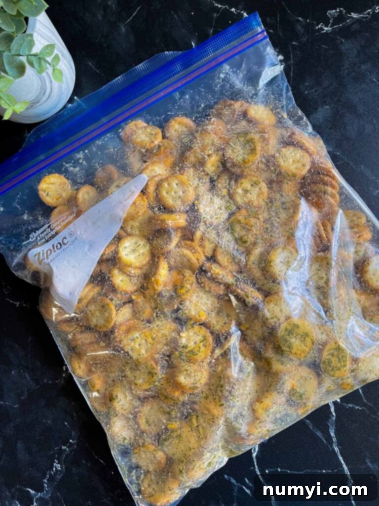 Zesty Ranch Cheese Poppers 5 Ritz Bits crackers with mixture in a zip lock bag.
