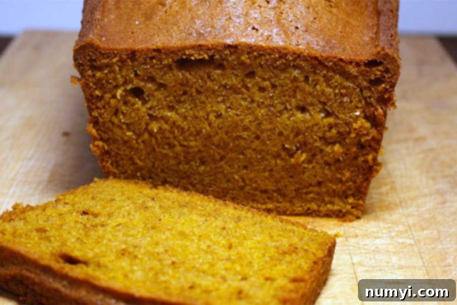 Starbucks Pumpkin Bread Recipe on a wooden board.