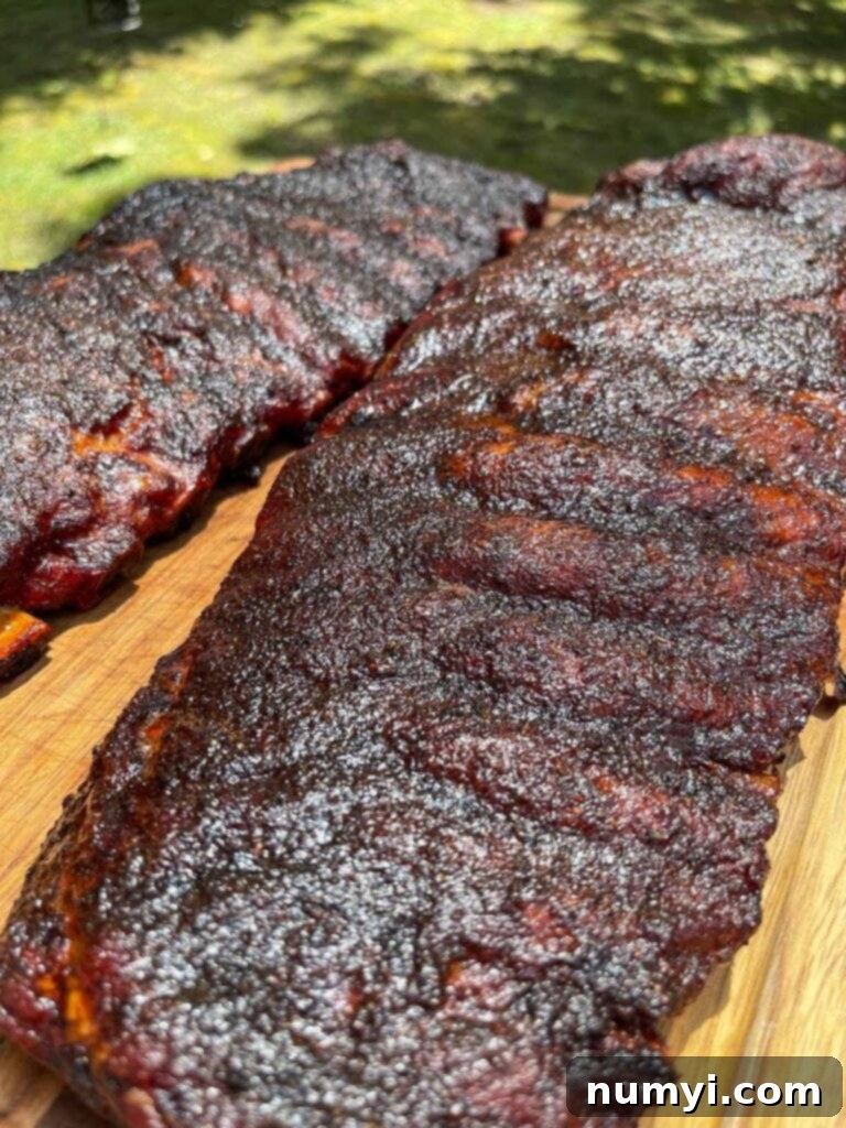 A perfectly smoked rack of St. Louis style ribs, just removed from the smoker.