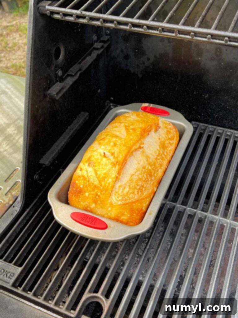 The finished sourdough loaf, baked to perfection on the smoker.