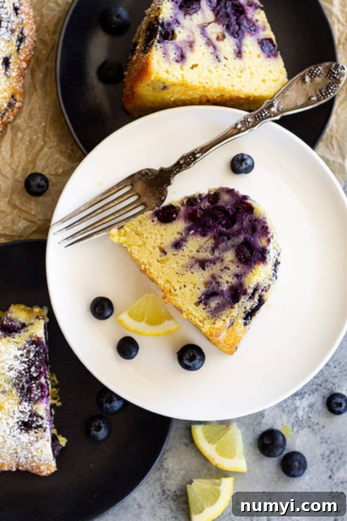 Top down view of a slice of lemon blueberry bundt cake.