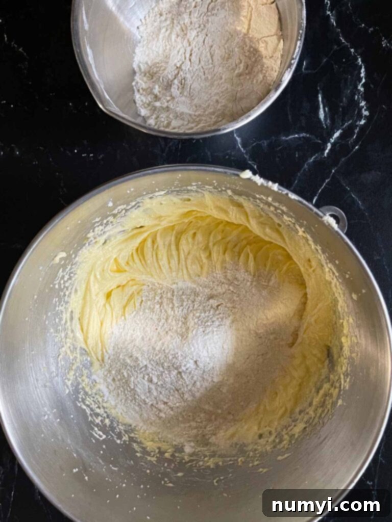 Ingredients for old fashioned sour cream pound cake in mixing bowls.