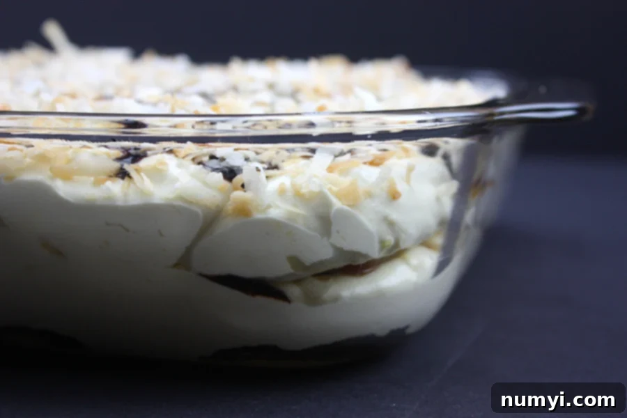Samoa Cake in a glass baking dish.