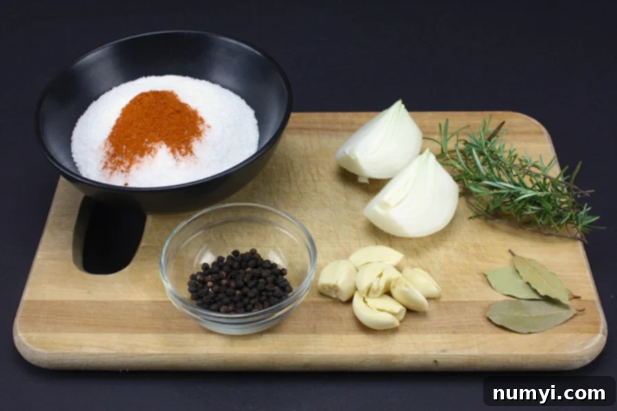 Effortless Pork Shoulder Brine 7 Simple Pork Shoulder Brine ingredients on a cutting board.
