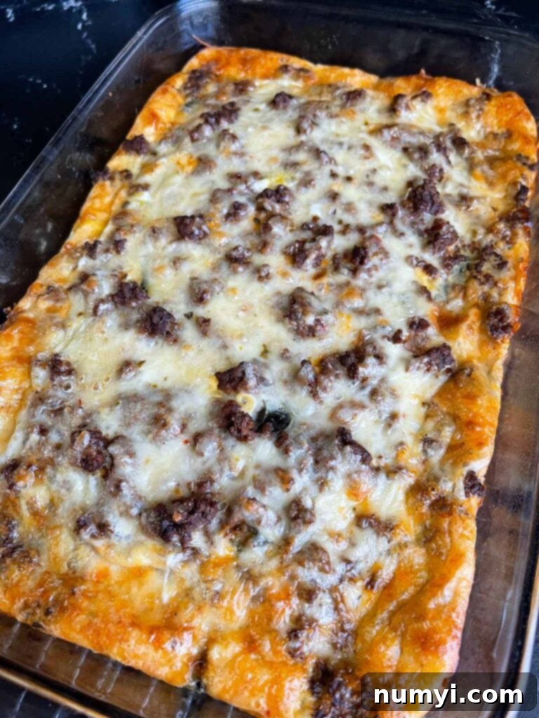 The Ultimate Chile Relleno Casserole 13 Chile Relleno Casserole in a glass baking dish.