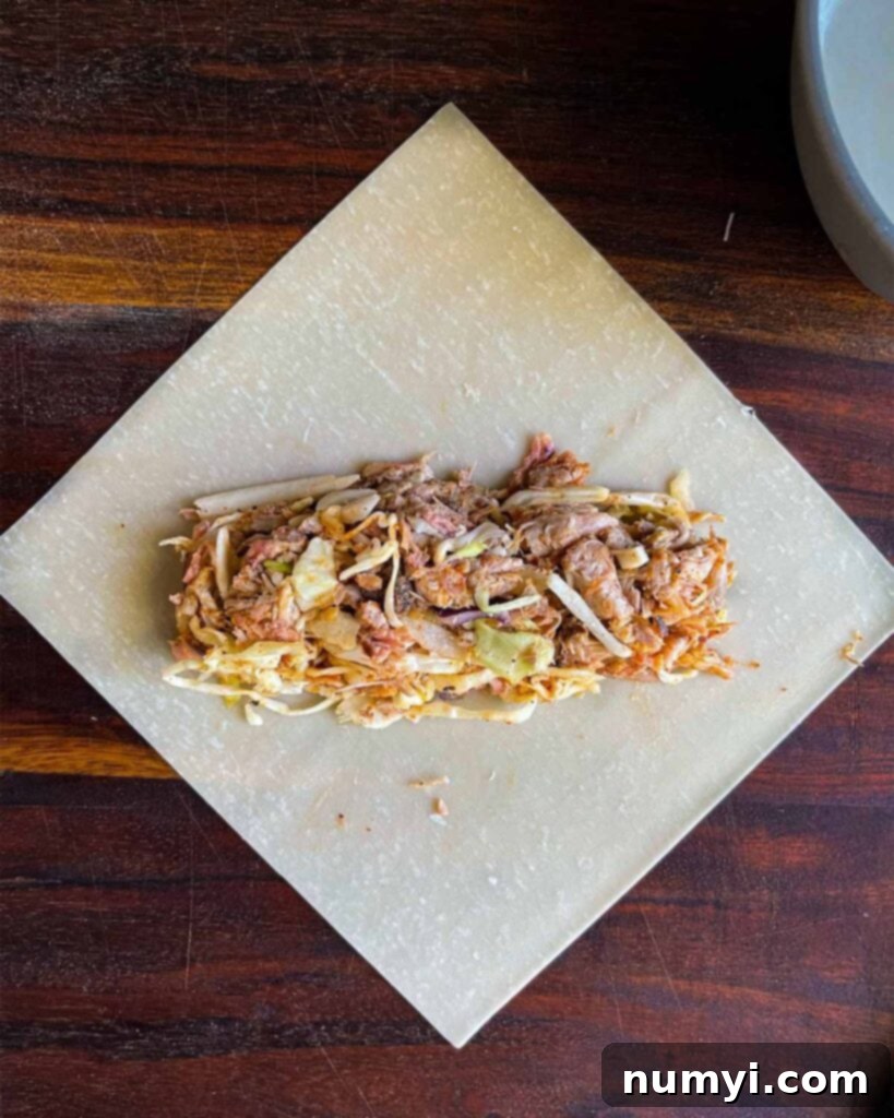Redneck egg roll mixture on an egg roll wrapper.
