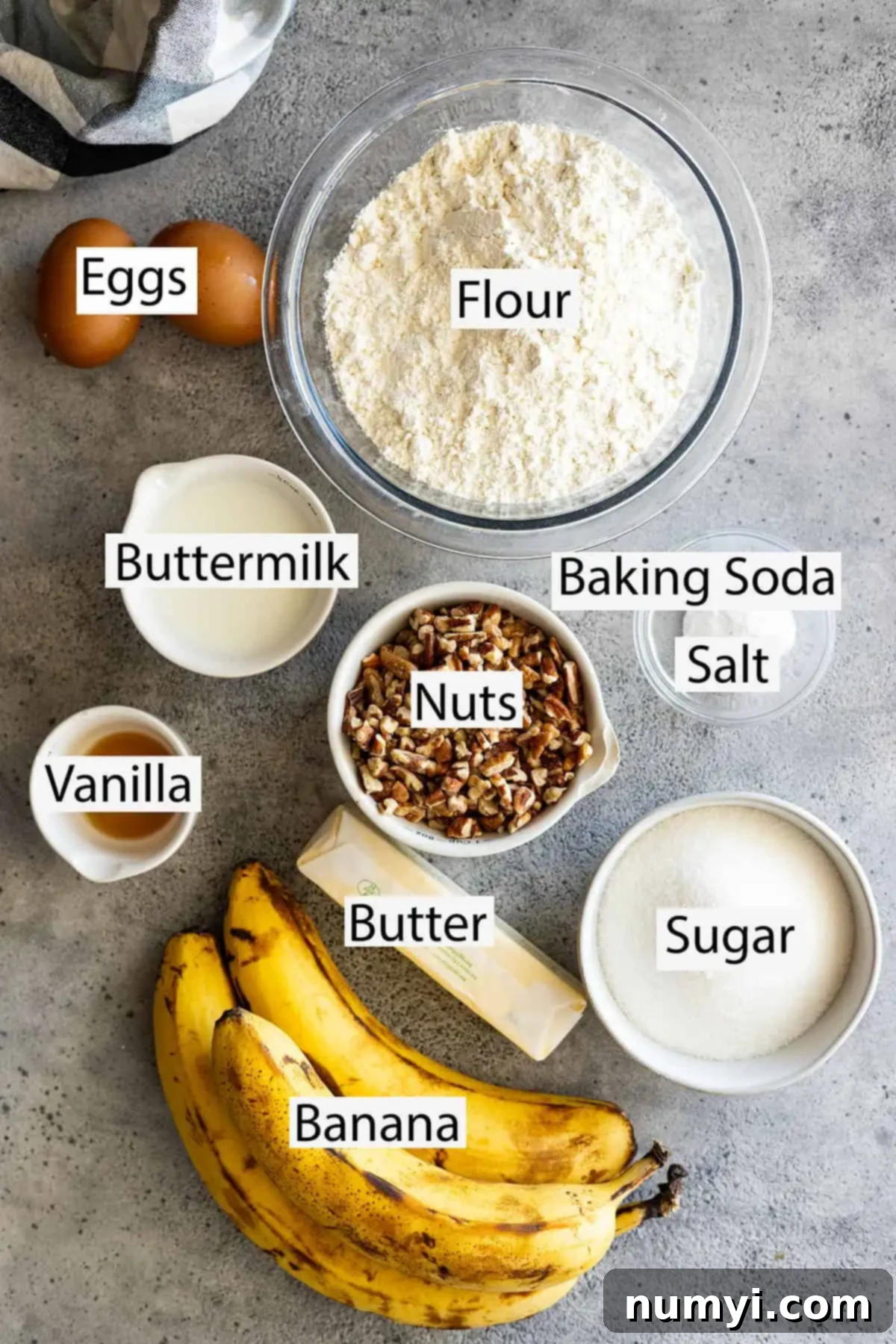 Ultimate Banana Nut Loaf 3 Ingredients: flour, eggs, buttermilk, baking soda, salt, nuts, vanilla, butter, sugar, and bananas.