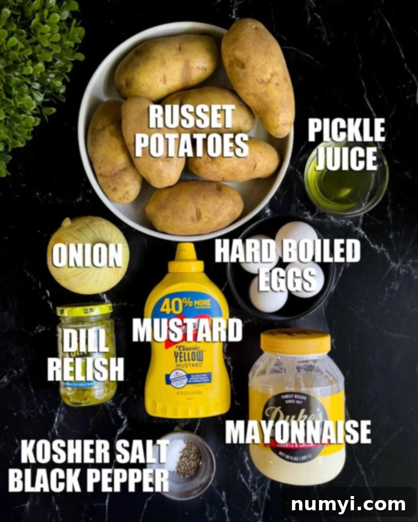 Various classic Southern potato salad ingredients including potatoes, mayonnaise, mustard, and relish, displayed on a dark surface.