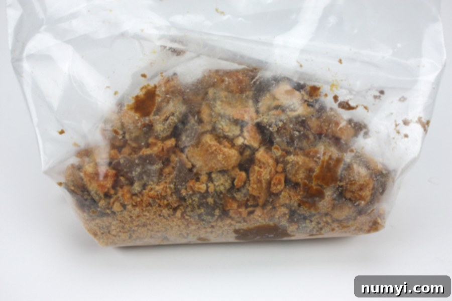 Butterfinger Dream Pie 5 Crushed Butterfinger candy bars visible through a clear zip-top bag.