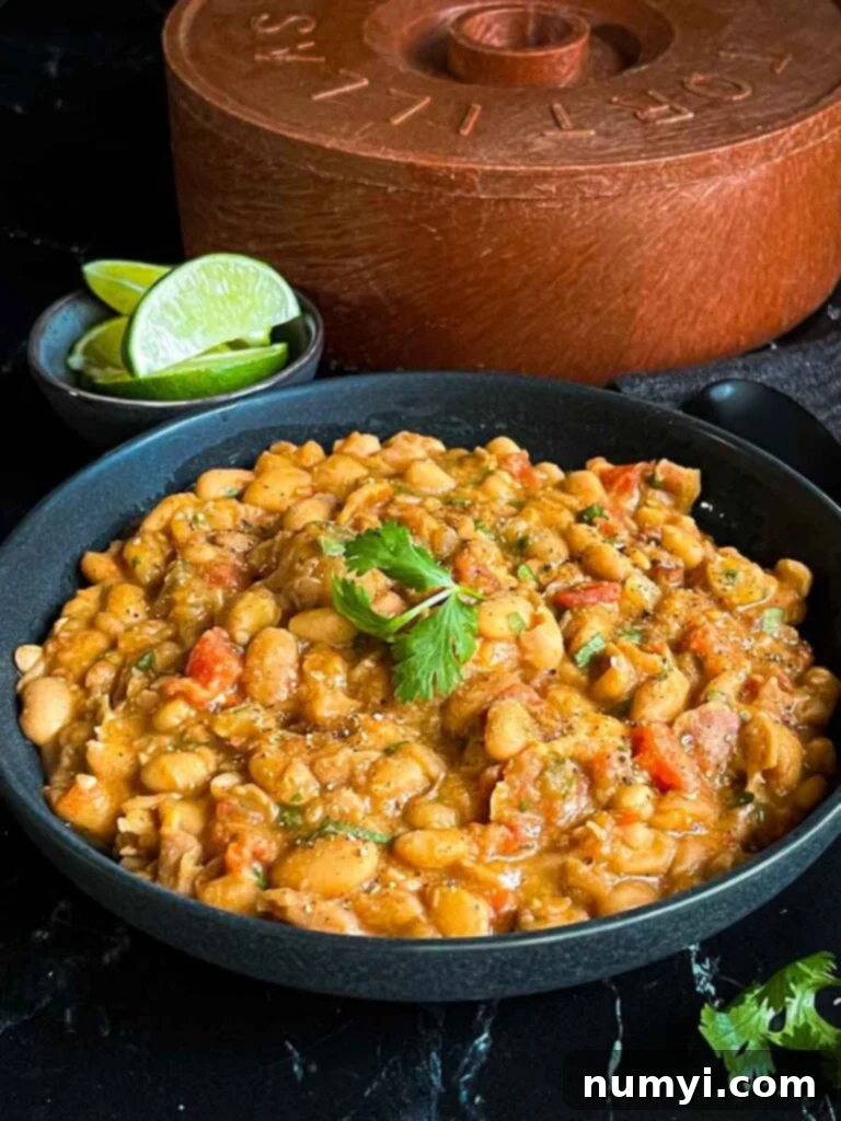 Beer-Braised Beans 3 Borracha beans (drunken beans) in a dark bowl.