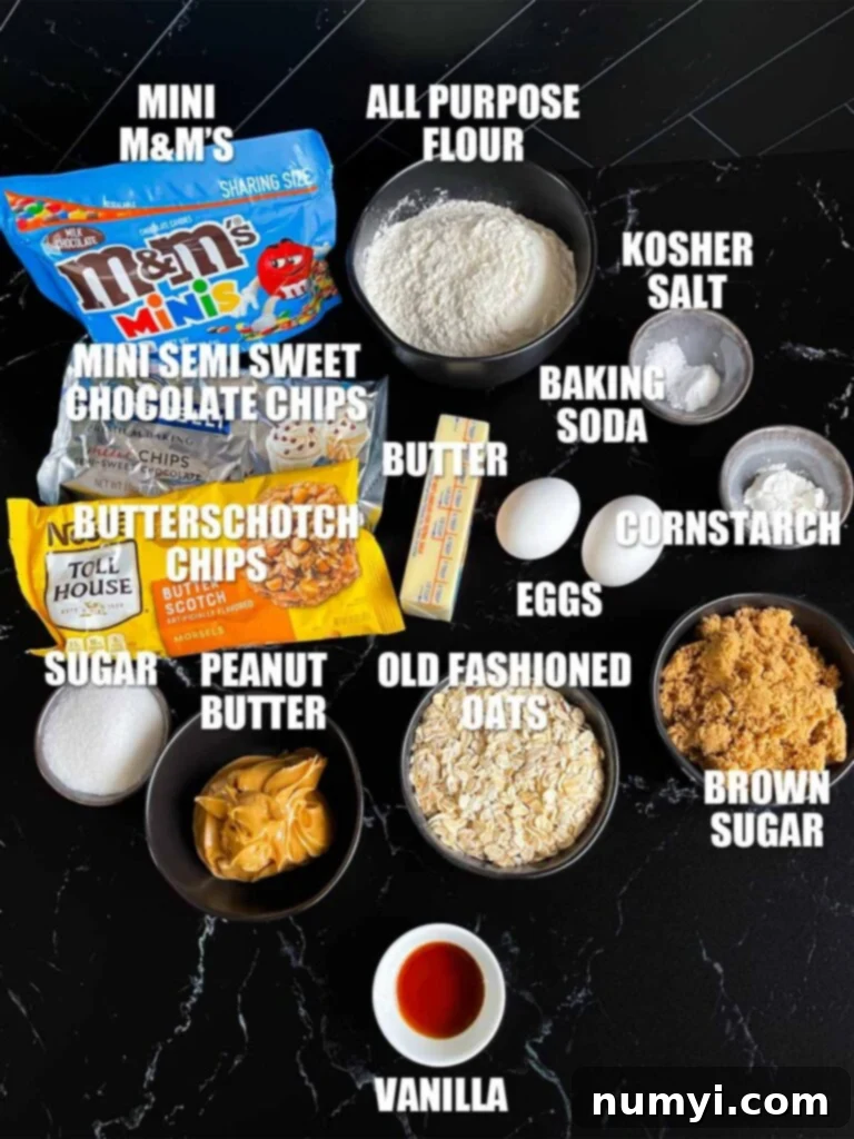 Monster cookies recipe ingredients laid out on a dark surface, ready for baking.