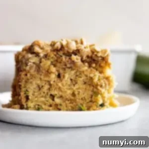 A large serving of zucchini coffee cake with lots of streusel topping!