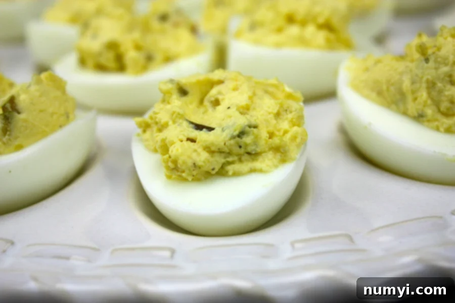 Devilled eggs in a devilled eggs platter.