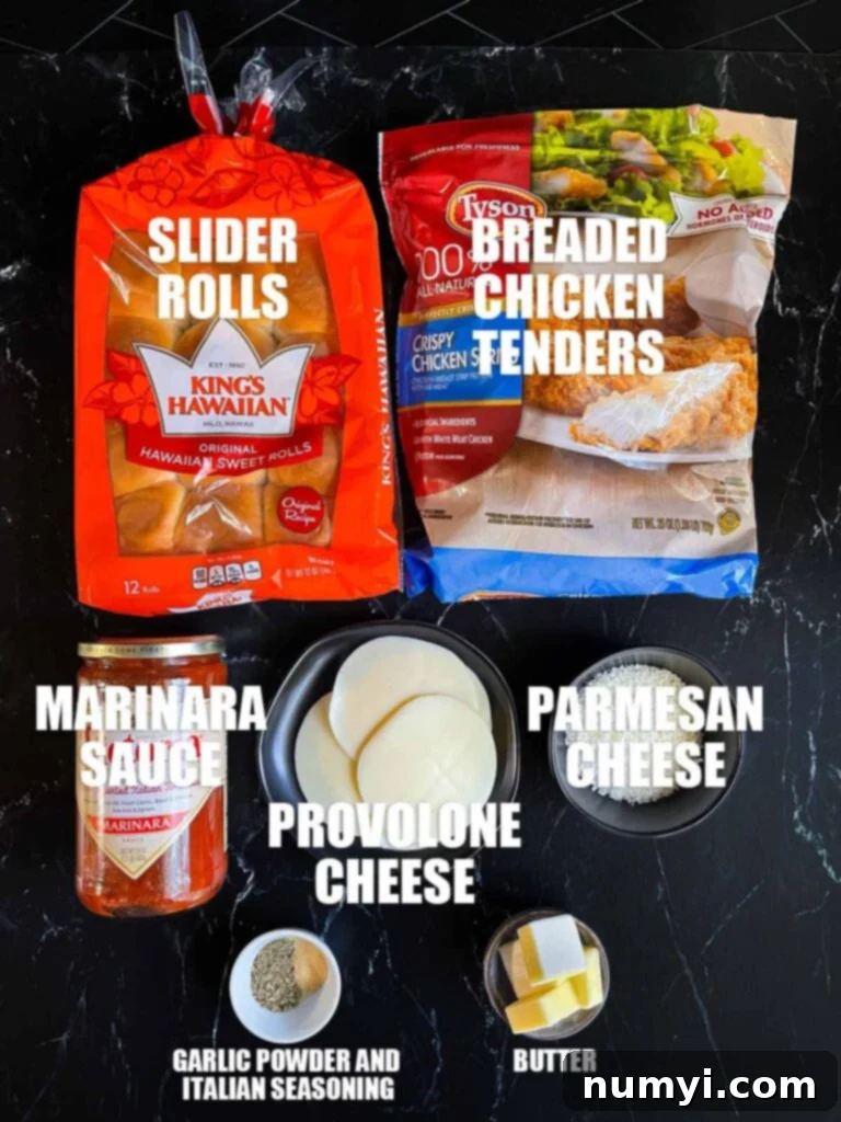 Individual ingredients for chicken parmesan sliders laid out on a dark surface.