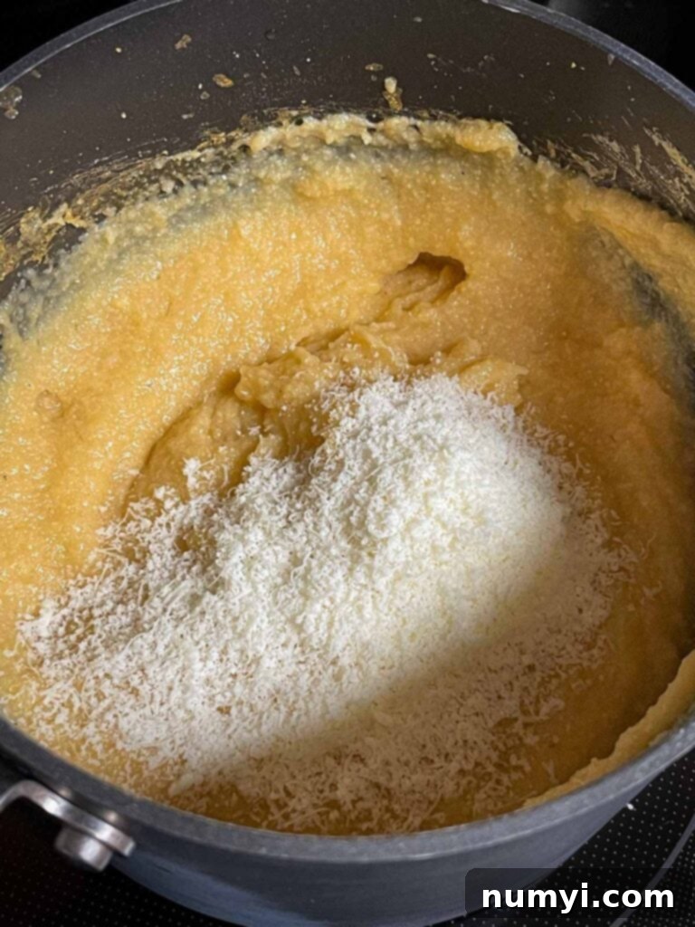 Parmesan cheese added to polenta.