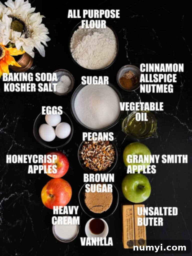 Apple Dapple labeled ingredients laid out on a dark surface.