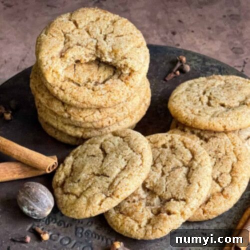Cozy Chai Sugar Cookies 10 Chai sugar cookies on an old metal cake pan.