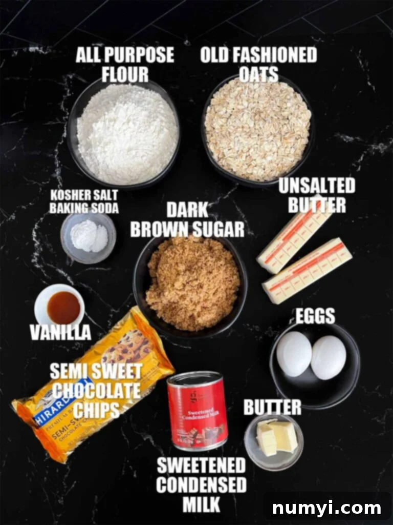 Oatmeal fudge bars recipe ingredients on a dark surface.