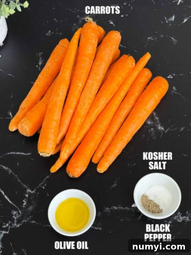 Sweet & Savory Roasted Whole Carrots 3 Roasted whole carrots recipe ingredients on a dark surface.