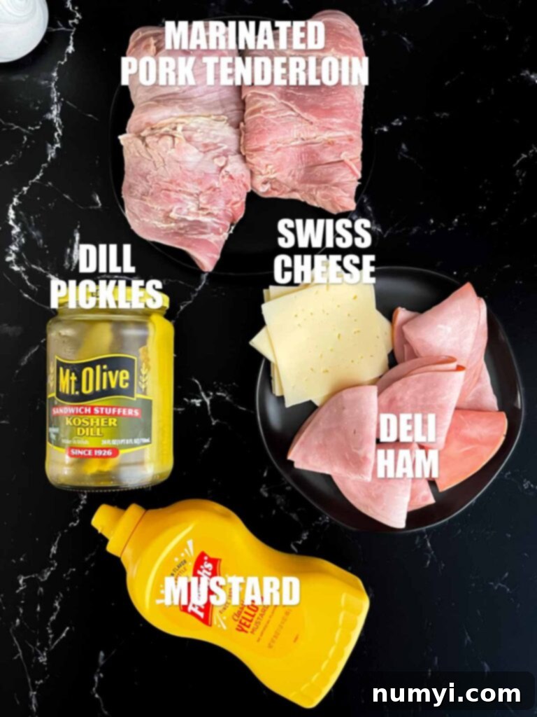 Deli ham, Swiss cheese, and optional pickles and mustard for the tenderloin stuffing and serving.