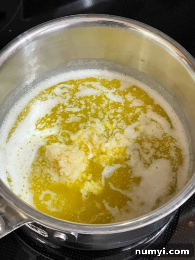 Melted butter in a saucepan.