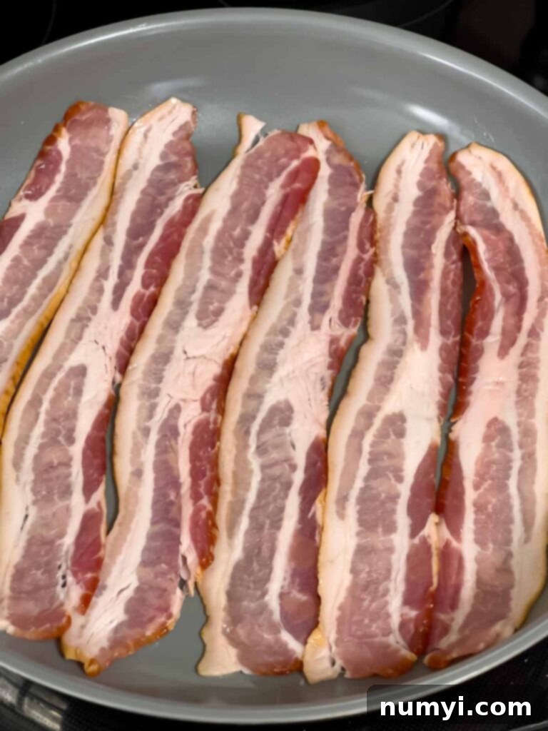 Bacon in a skillet.