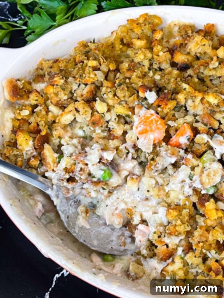 Another view of the delicious Chicken Stuffing Casserole in a baking dish, ready for serving.