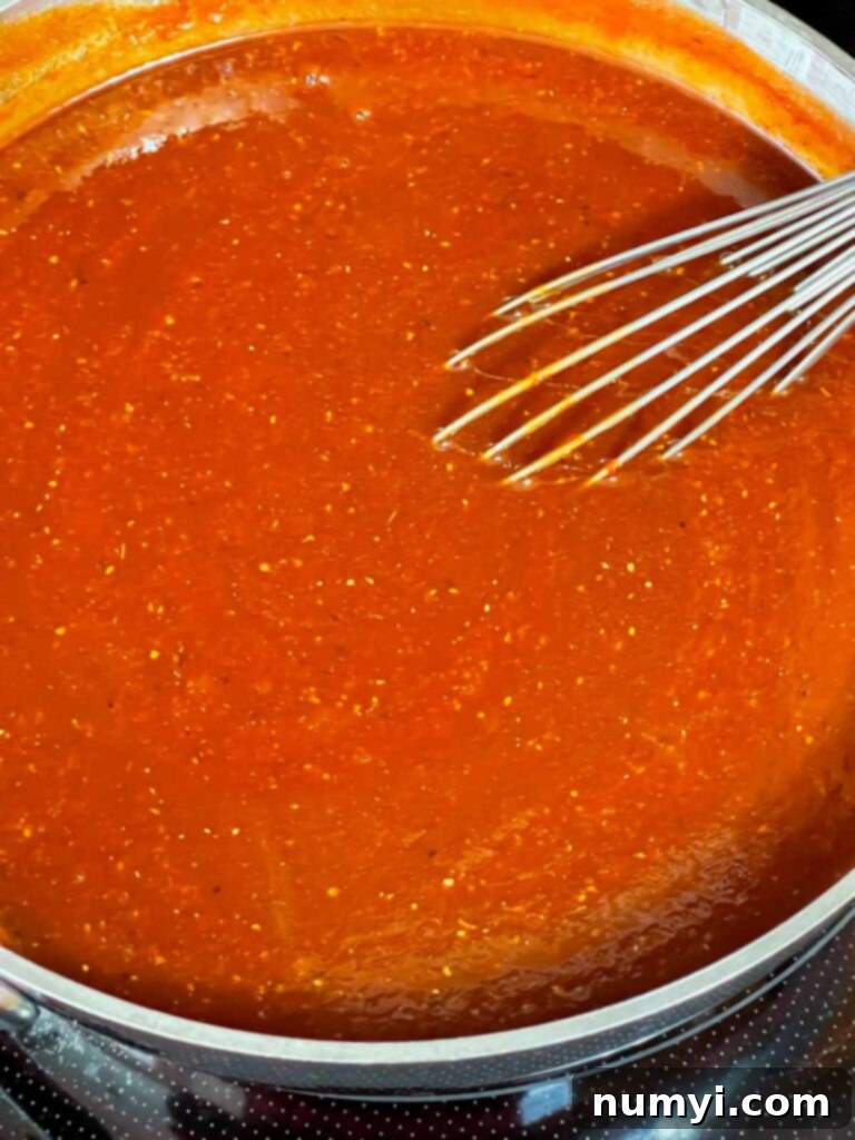 Kansas City style barbecue sauce simmering on the stovetop.
