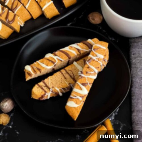 Chai biscotti on a dark plate.