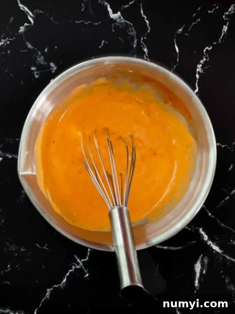 Bang bang sauce mixed in a bowl.
