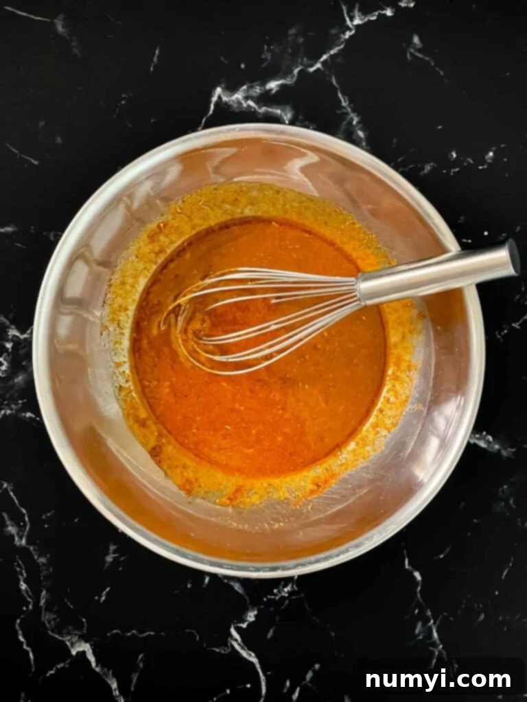 Southwest marinade ingredients thoroughly whisked together in a bowl.