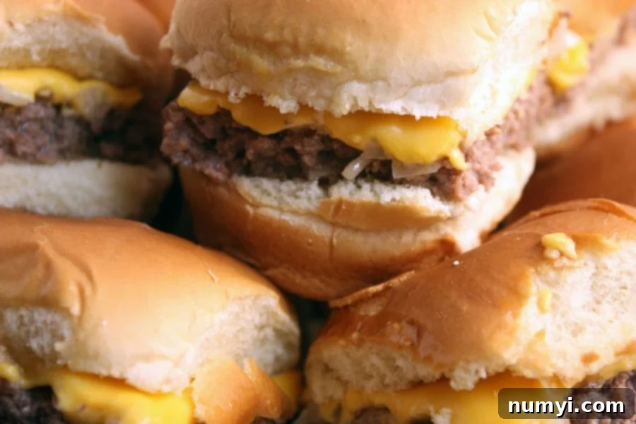 A tray of golden-brown oven-baked sliders, perfect for serving a large party or game day event.