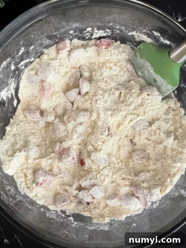 Luscious Strawberry Scones 5 Diced fresh strawberries mixed with dry ingredients and grated butter for scones.
