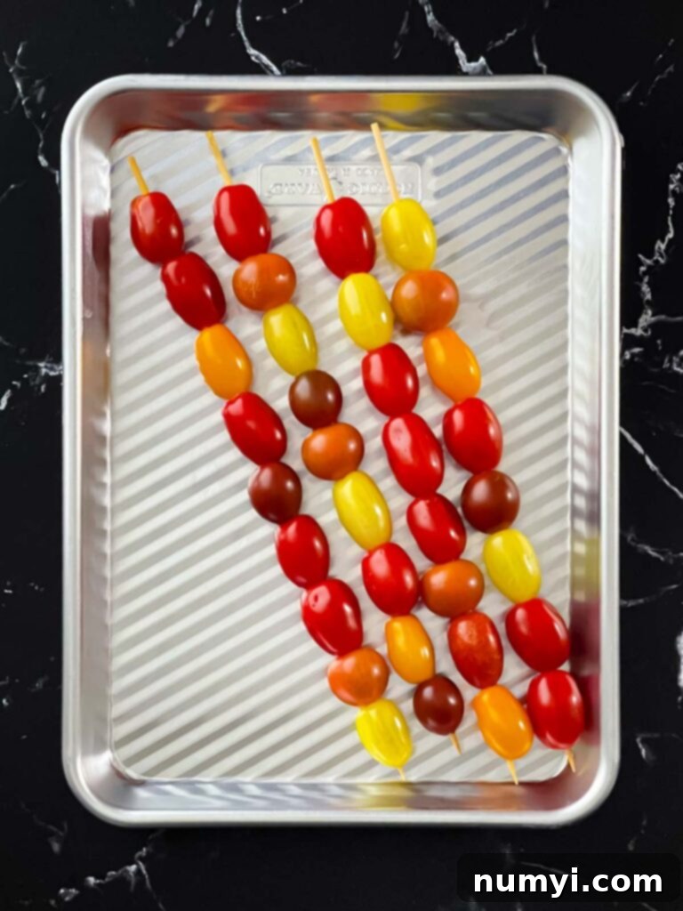 Fresh Grilled Shrimp and Corn Salad 10 Grape tomatoes threaded onto wooden skewers, ready for grilling.