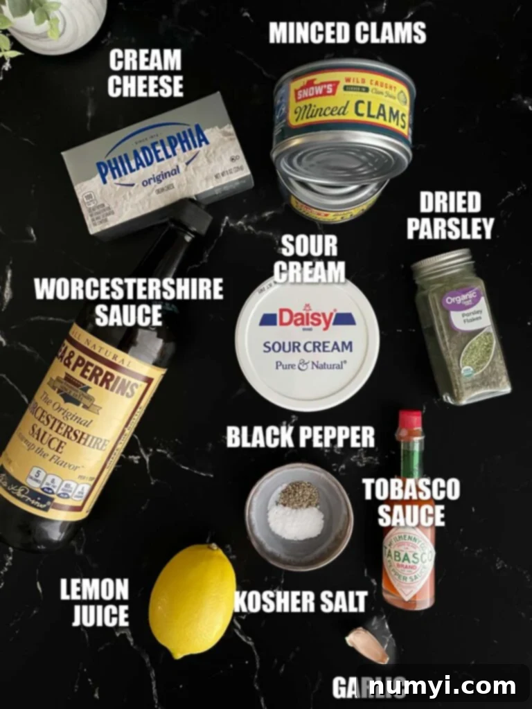 Creamy Clam Dip 3 Clam dip recipe ingredients on a dark surface.