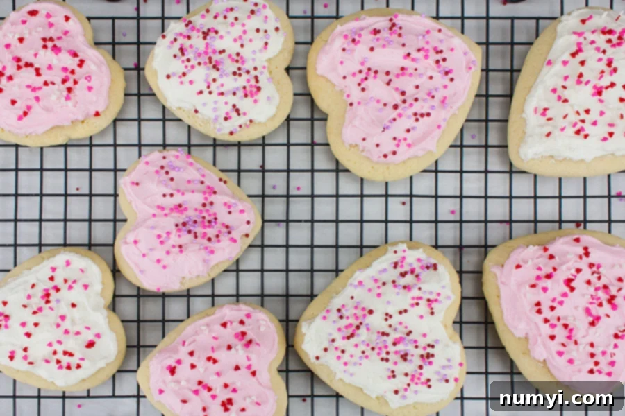Soft Frosted Sugar Cookies on a wire rack.