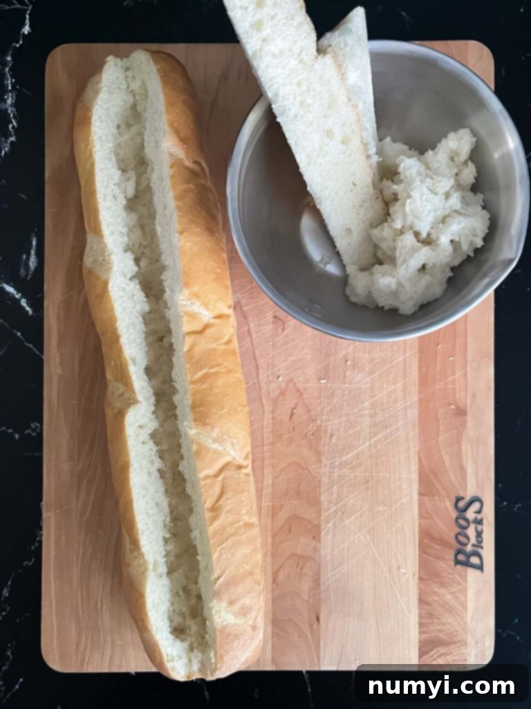 Loaded Sausage and Egg Baguette 11 Hollowed-out French bread loaf, ready for the filling.